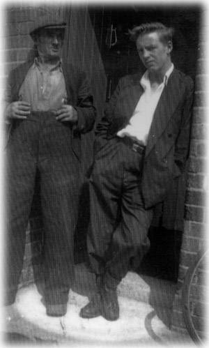 Ned in later life with one of his sons, at their front door.