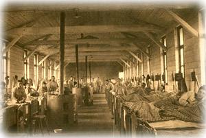 This interior view of a hospital ward at Limburg Prisoner of War camp appeared in a propaganda publication. Captions appeared in German, French and English. 